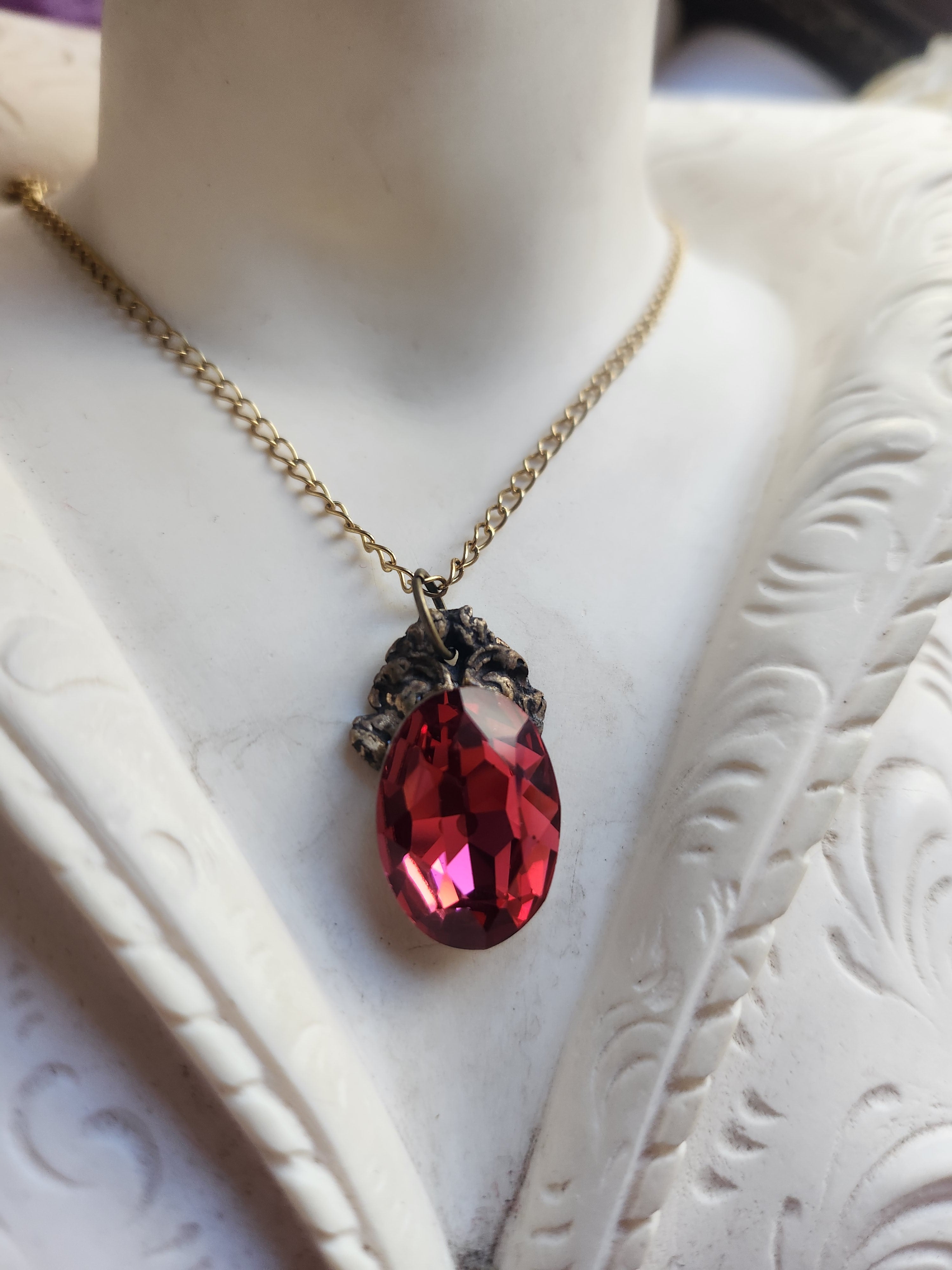 Arcane Resonance Collection – Small Handmade Bronze Pendant with Light Red Oval Crystal