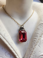 Arcane Resonance Collection – Handmade Bronze Pendant with Red Octagon Crystal