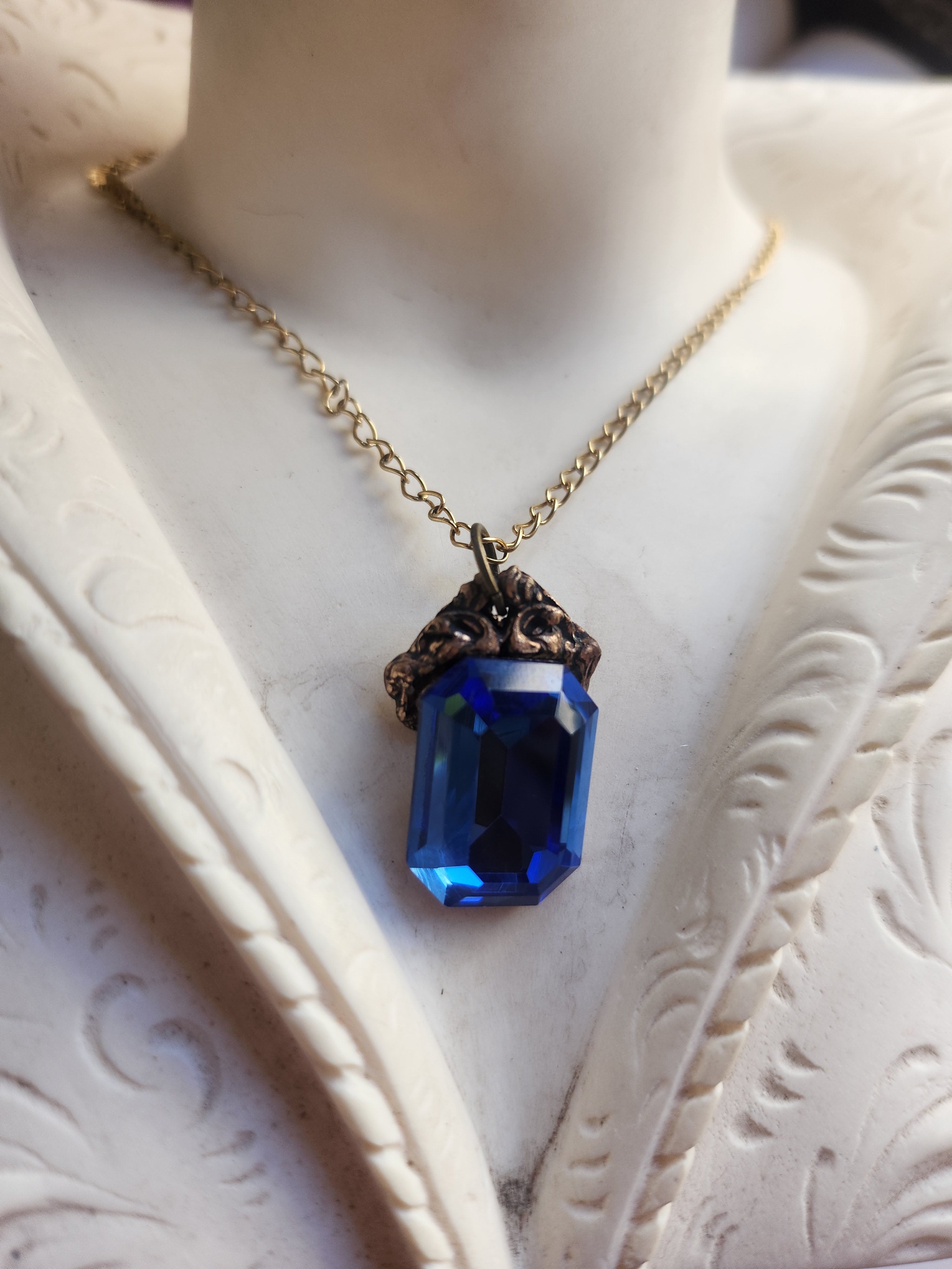 Arcane Resonance Collection – Handmade Bronze Pendant with Blue Octagon Crystal