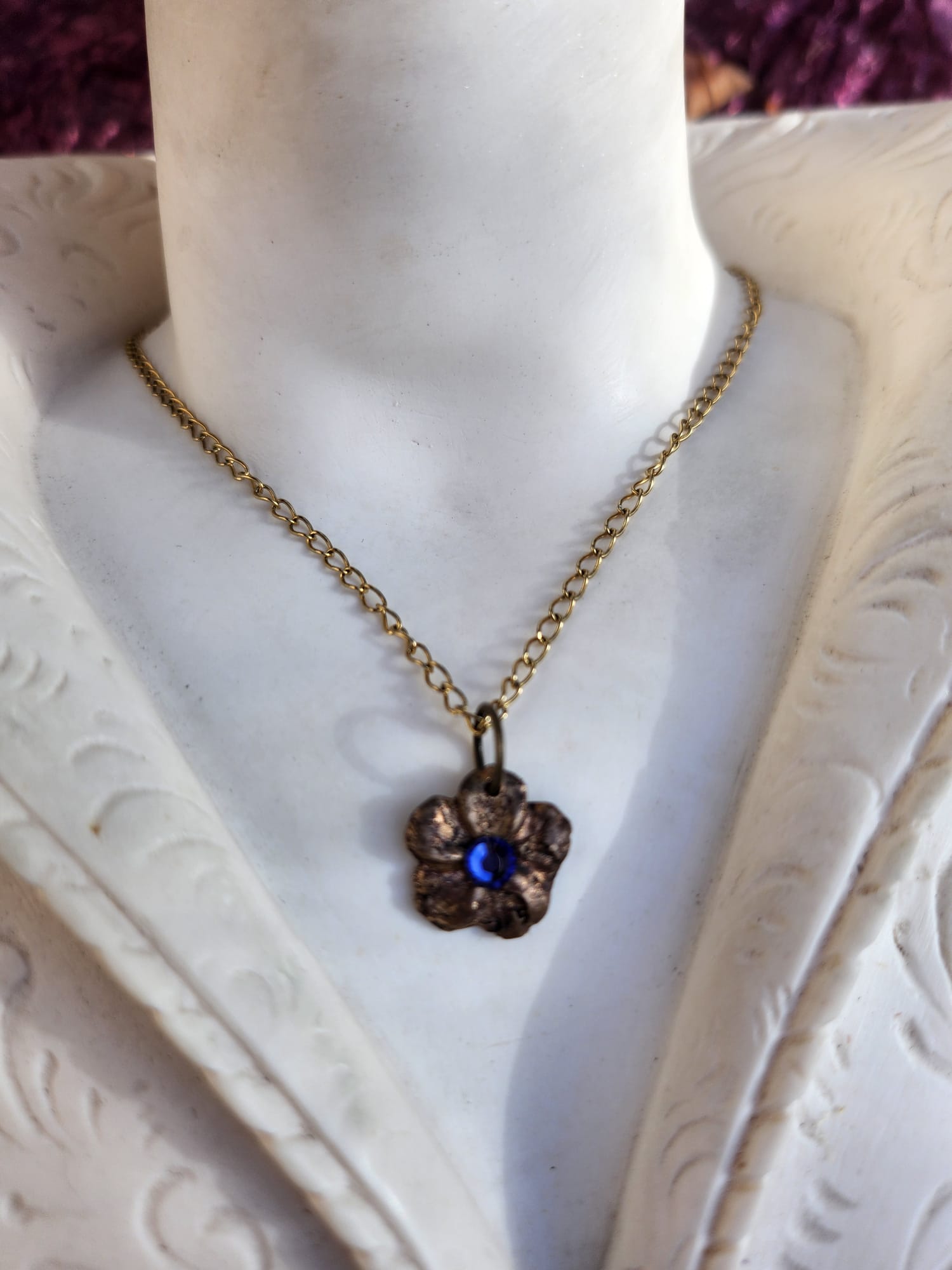 Eternal Bloom Collection – Handmade Bronze Flower Pendant with Tanzanite Crystal