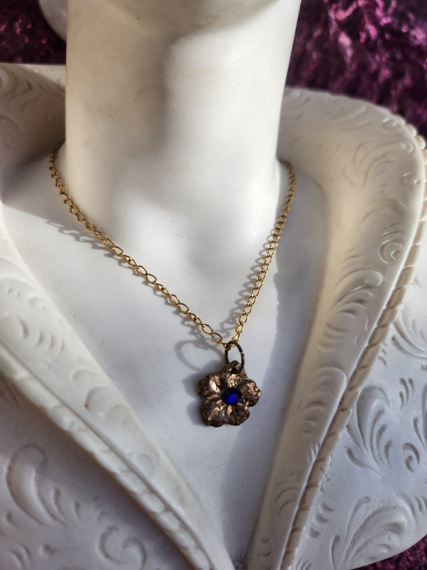 Eternal Bloom Collection – Handmade Bronze Flower Pendant with Royal Blue Crystal