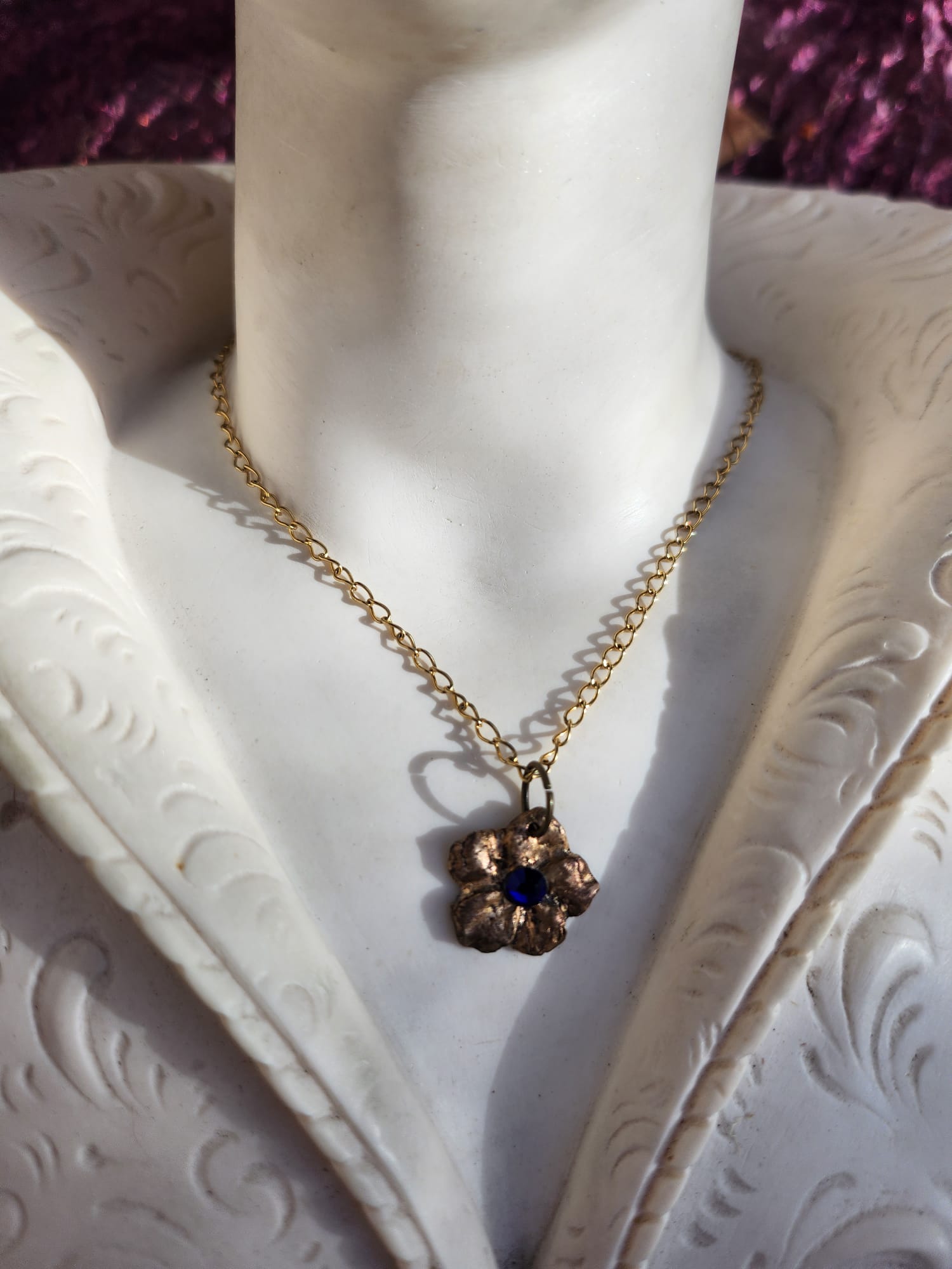 Eternal Bloom Collection – Handmade Bronze Flower Pendant with Royal Blue Crystal