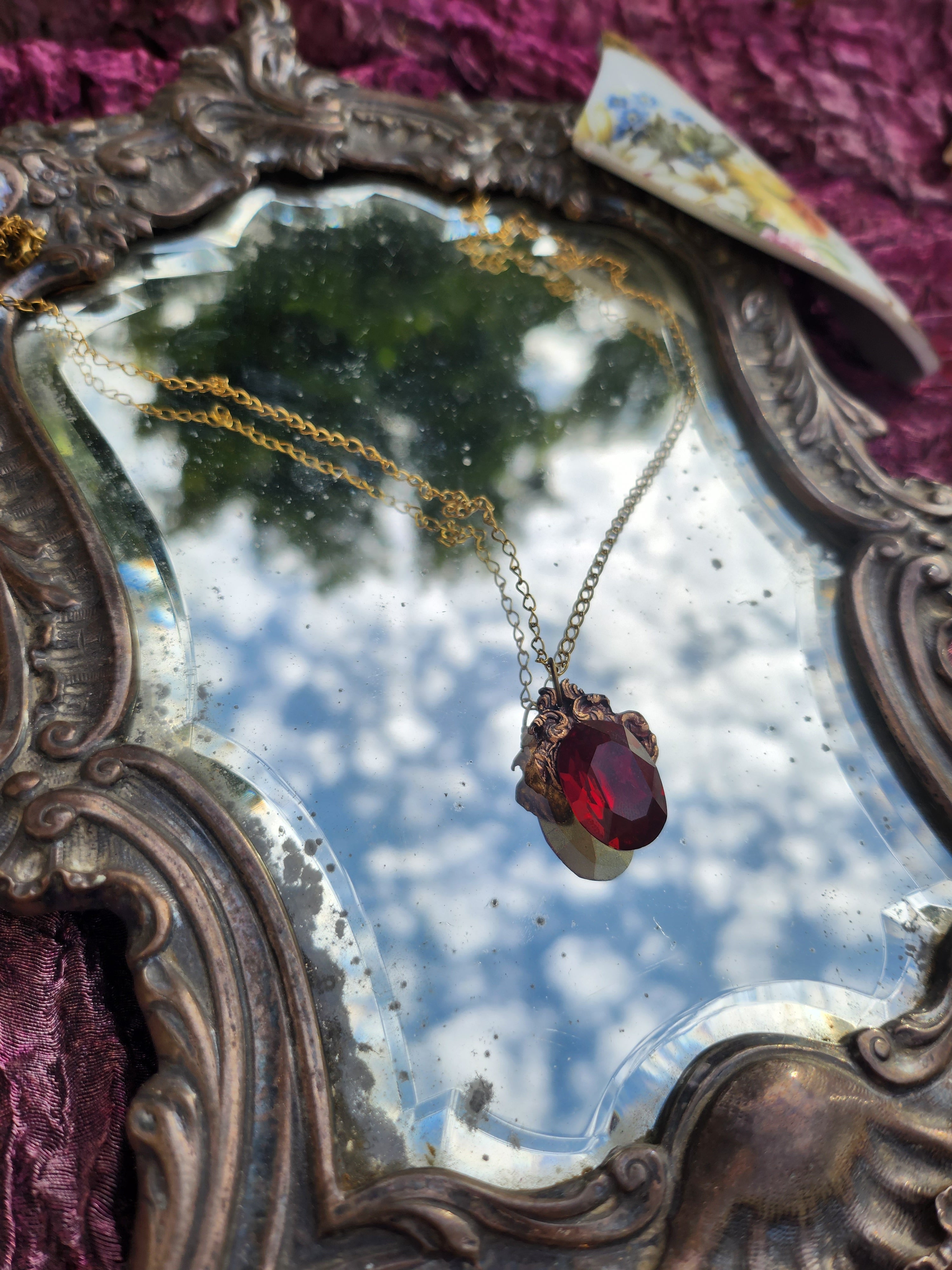 Arcane Resonance Collection – Handmade Bronze Pendant with Ruby Red Oval Crystal