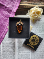 Mystic Baroque Collection – Handmade Bronze Pendant with Brown Oval Crystal